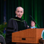 Faculty member giving a speech