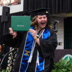 Student excited after receiving their degree