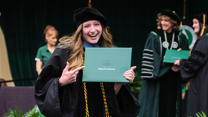 Graduate celebrating