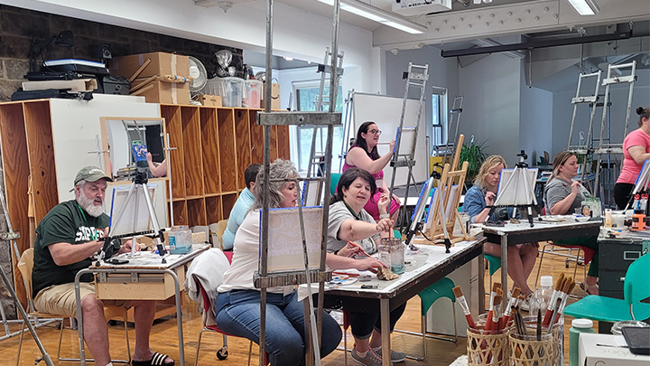 Attendees of the 2024 Alumni Weekend enjoyed a painting class that returns for the 2025 event.