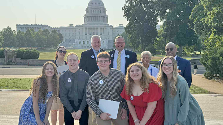 Music education leaders in front of the U.S. Capitol Building