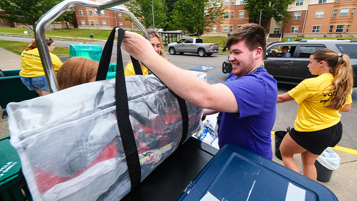 A first year student moving in.