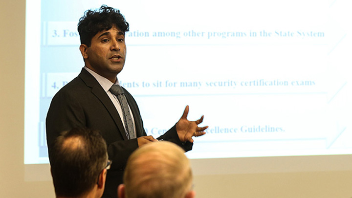 Nitin Sukhija presenting for the trustees.