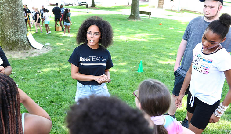 RockTEACH instructor talking to high school students