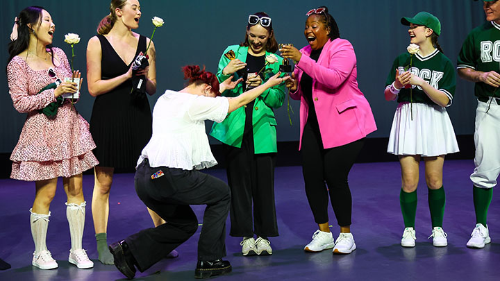 Professor and student celebrate winning the event