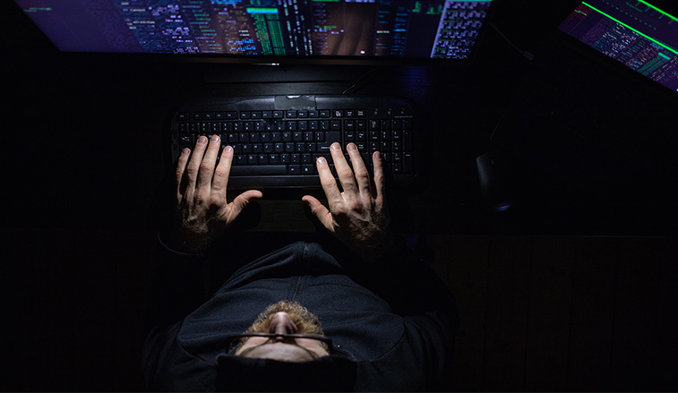 cybersecurity specialist working