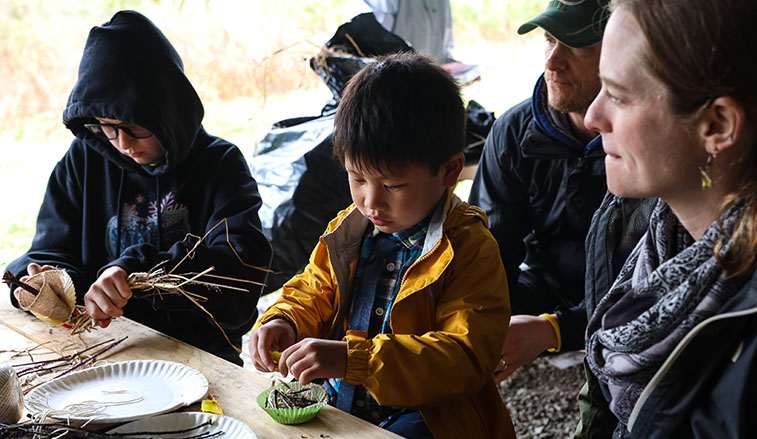 Young children working on Earth Day crafts