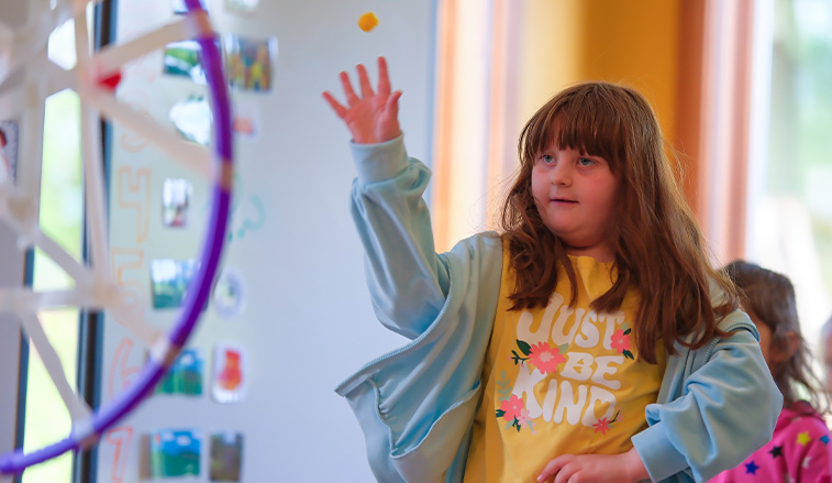 Child playing at Macoskey Center