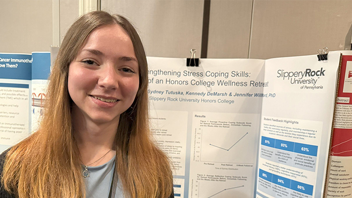Alexandra Caldwell with her poster.