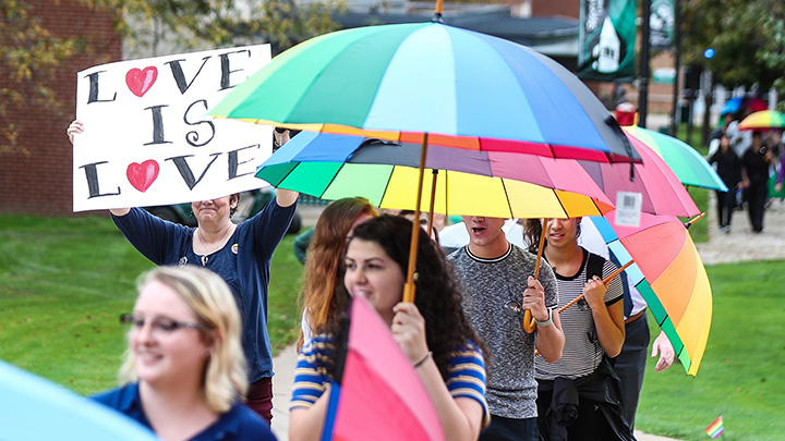 Pride march with rainbow umbrellas
