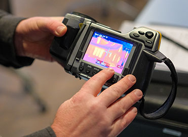 Hands holding camera