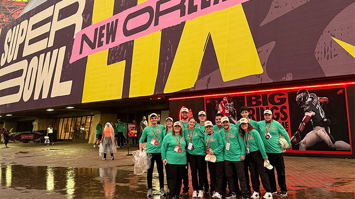 SRU sport management students standing outside the Superdome in New Orleans at Super Bowl LIX.