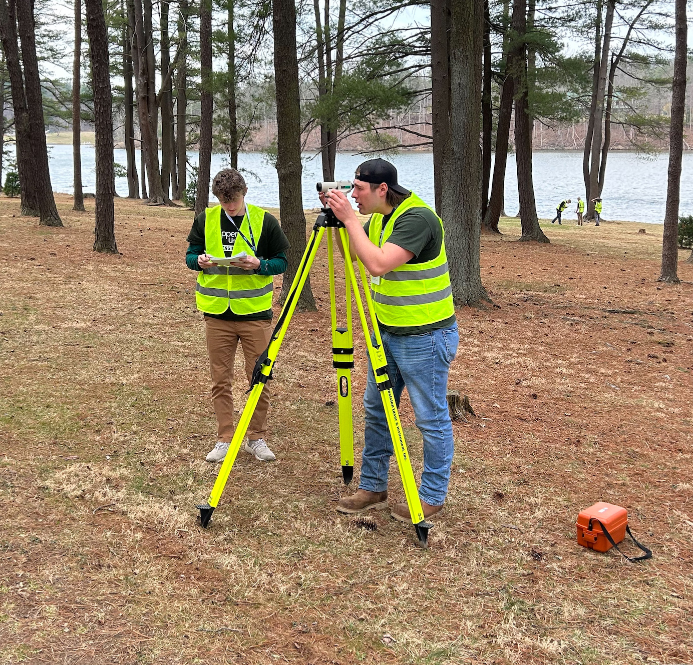 From left, SRU students Jack Bridges and Michael Armanini participate in a surveying competition and at the 2025 Mid-Atlantic East and West ASCE Symposium at Penn State.