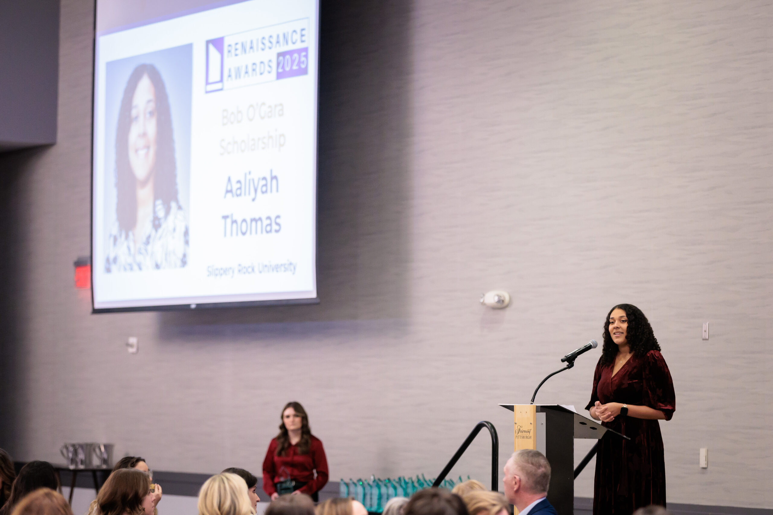 Aaliyah Thomas receiving scholarship award