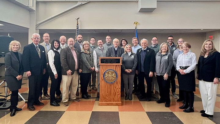 Members of the commission posing with President Riley