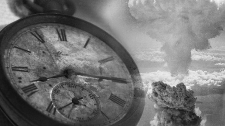 Clock face next to a mushroom cloud of atomic bomb