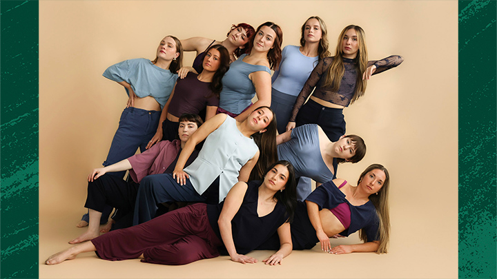 Group of 11 dancers posing in dance attire.