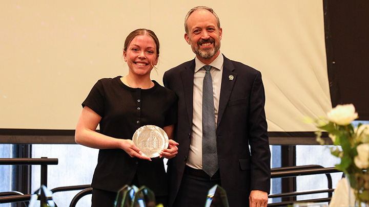 From left, Abby Becker, a senior mathematics major from North Warren (Panama Central HS), is recognized as SRU’s nominee for the Syed Ali-Zaidi Award for Academic Excellence by SRU Provost Michael Zieg.