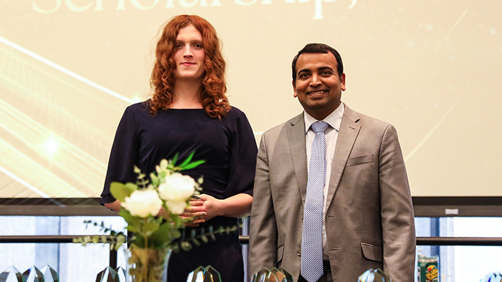 From left, Cassandra Clemency, a senior economics major from Slippery Rock (Slippery Rock HS), is awarded the Haverlack College of Business’ Outstanding Student in Research, Scholarship or Creative Activity award by Dean Prasad Vemala.