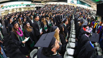 Grads in the field house
