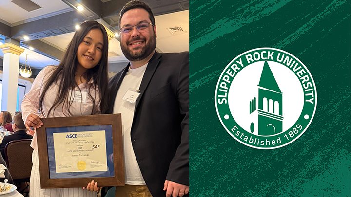 Student holding plaque at awards dinner with professor.