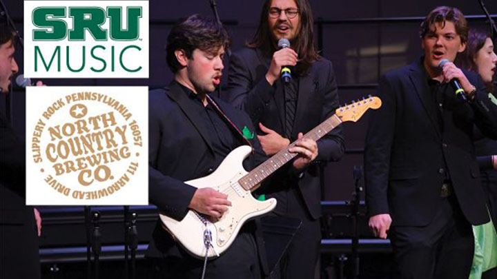Student playing guitar with background singers.