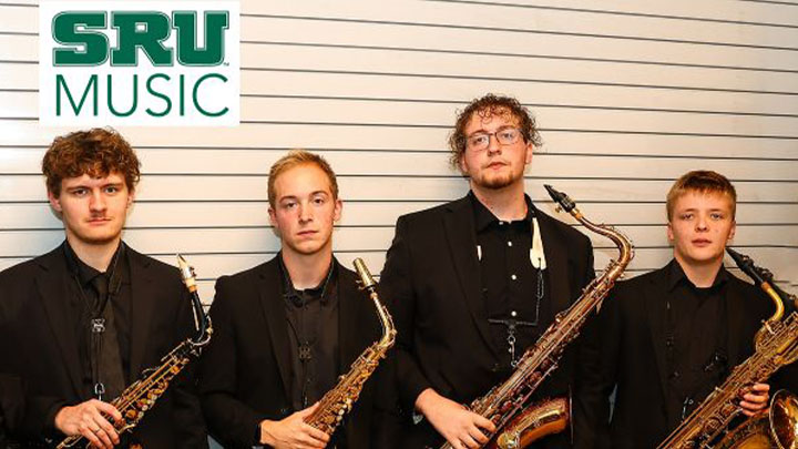SRU's saxophone players standing next to each other.