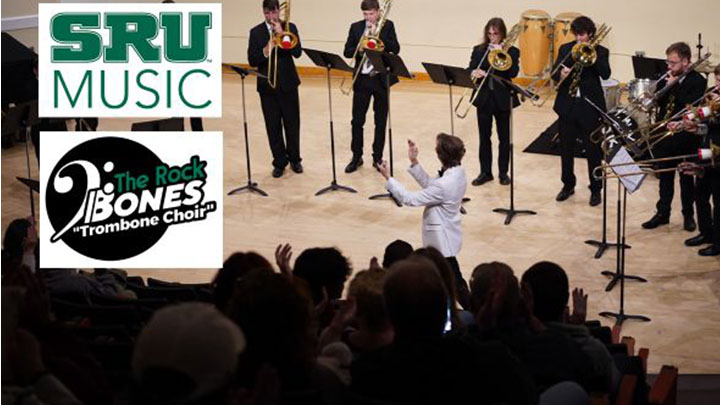 Students playing trombones in a concert.