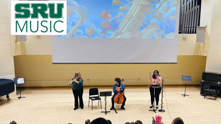 Students performing in front of audience.