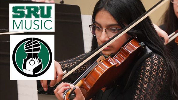 Student playing violin.