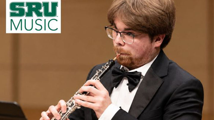 Student playing oboe.